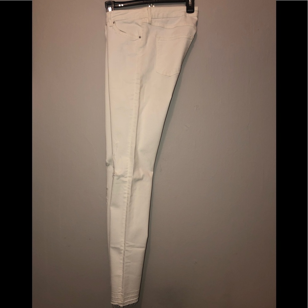 White skinny ripped jeans